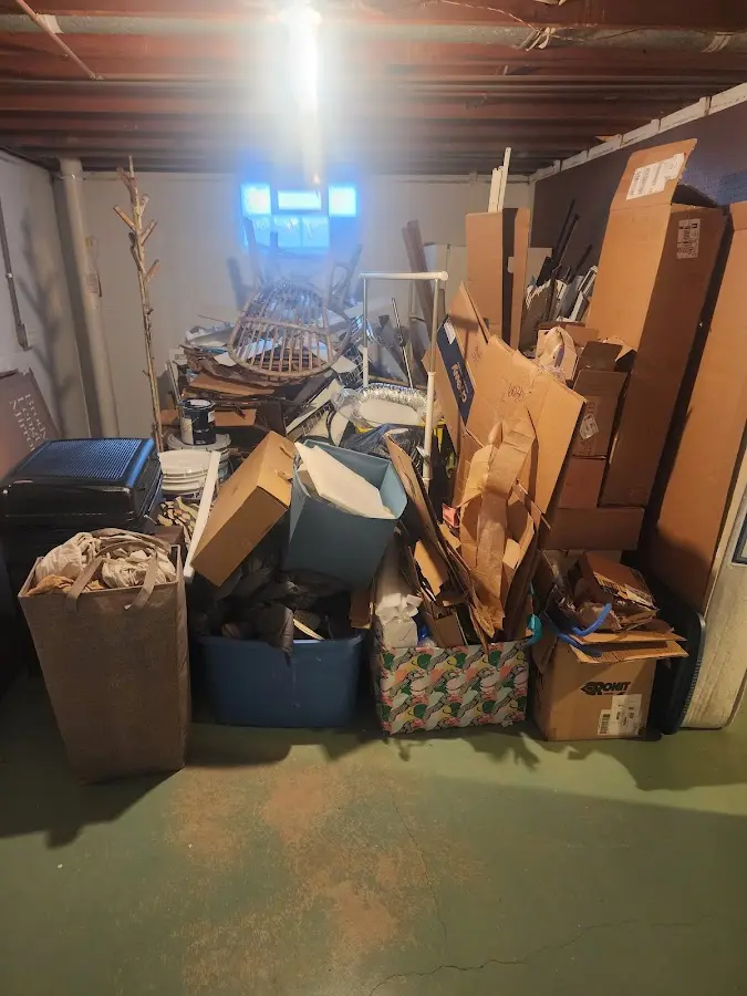 Roll-off dumpster container at job site for 2 Yard Dumpster Rental in North Myrtle Beach